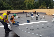 The Complete Guide to Commercial Flat Roof Installation: Best Practices and Considerations